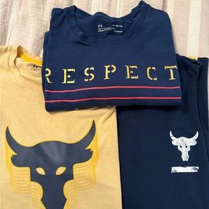 3 Under Armour Project Rock Shirts- 2 Navy, 1 Yellow. Size XL